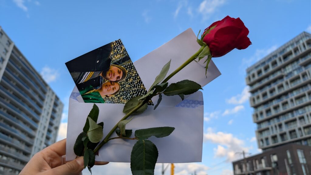 A Heart Drop Package Including Your Note, A 4x6 Photo, A fresh flower.